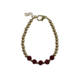 Gold bead with Red crystal center bracelet