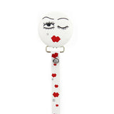 Black winking eye(s) & red lips design on white button pacifier clip