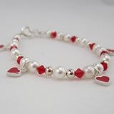 Baby Bracelet White Pearls and Red Crystals with Red hanging hearts (BRH)